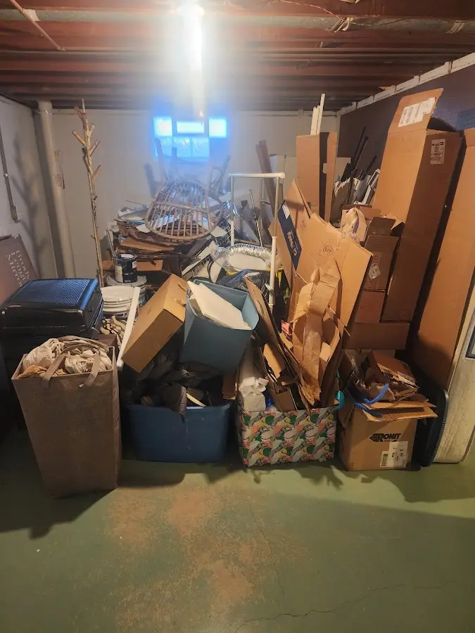 Roll-off dumpster container at job site for Concrete Dumpster Rental in Holmen